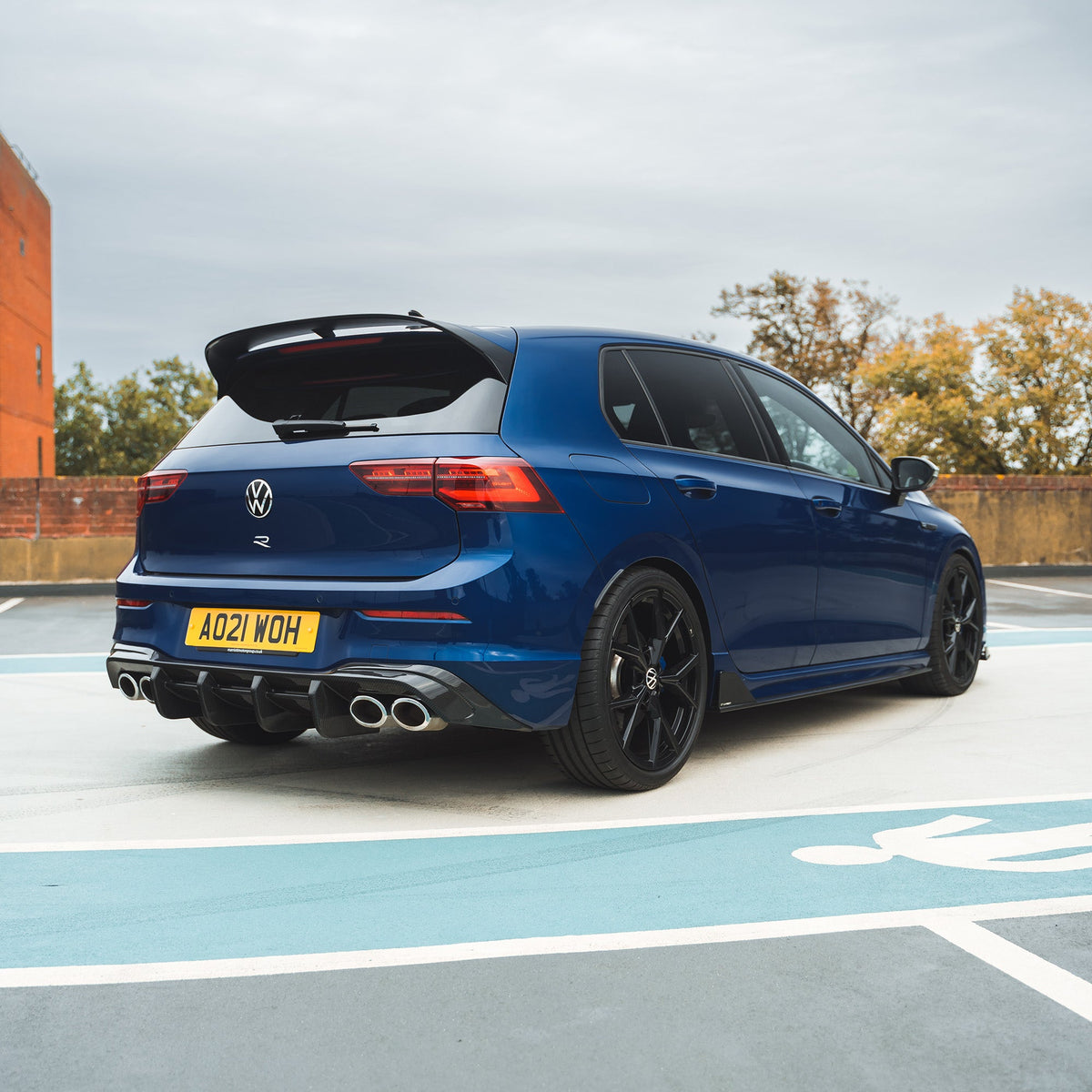 Full VW Golf MK8 R carbon fiber kit by CT Carbon, showcasing sleek, lightweight carbon fiber components on the car.