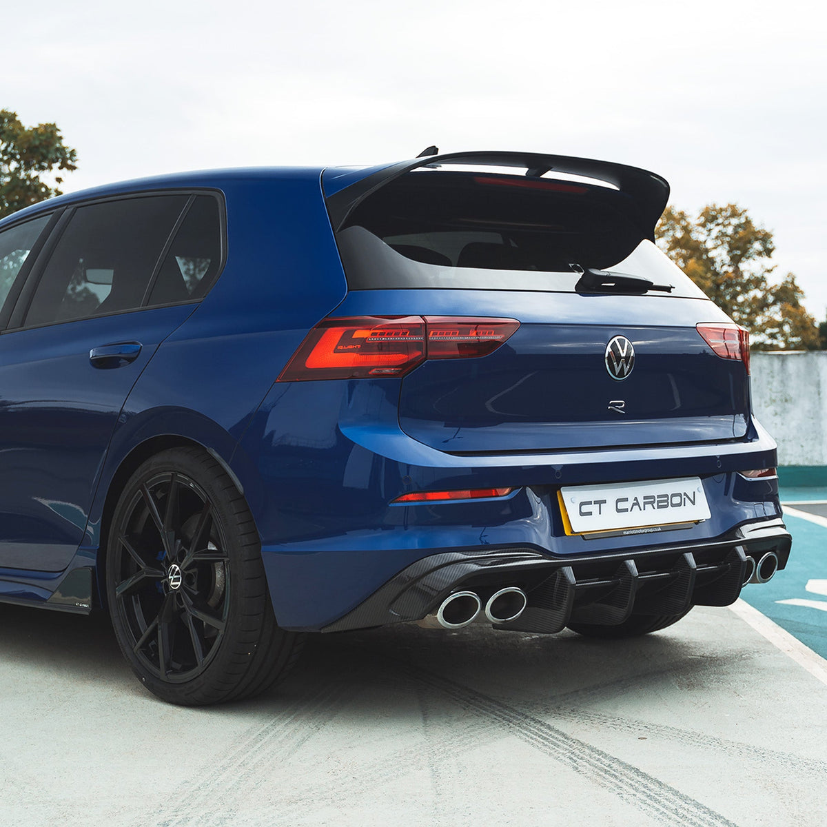 VW Golf MK8 R full carbon fiber kit by CT Design, featuring sleek carbon fiber panels and accents for a sporty look.