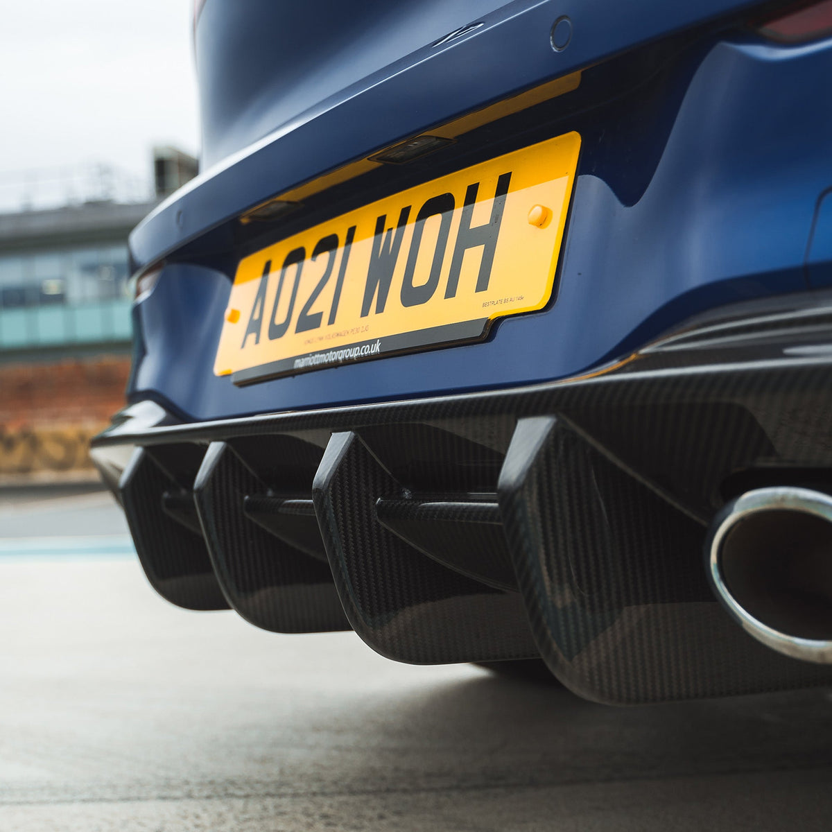 VW Golf MK8 R full carbon fiber kit by CT Design, showing sleek carbon fiber components on the car's exterior.