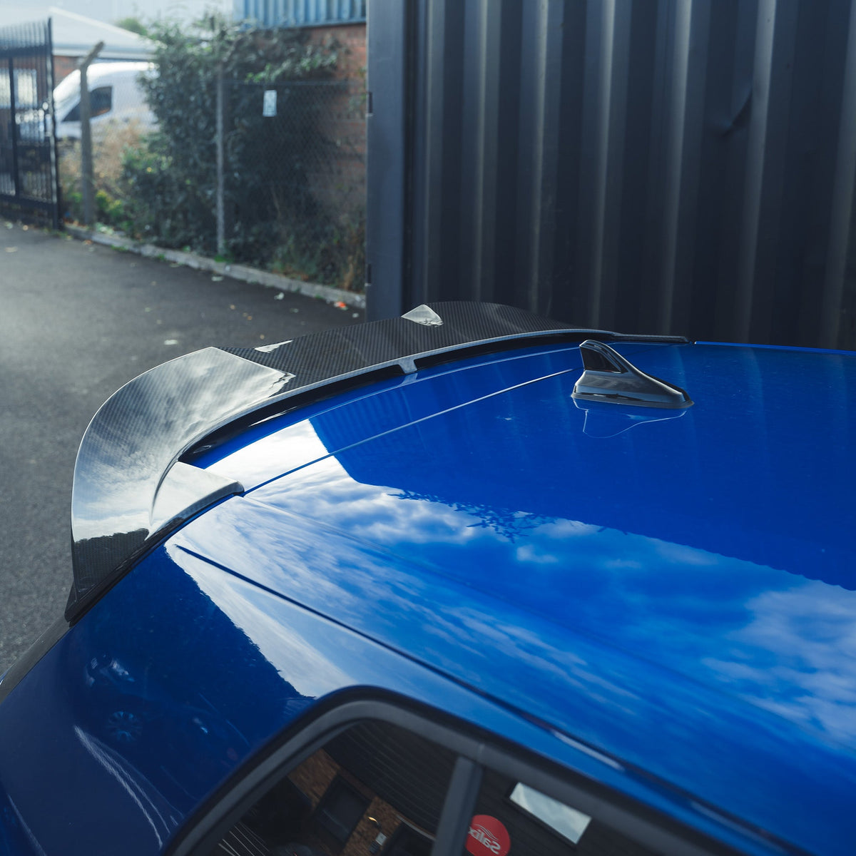 Full view of a VW Golf MK8 R with CT Design carbon fiber kit, showcasing the sleek, lightweight carbon fiber exterior details.