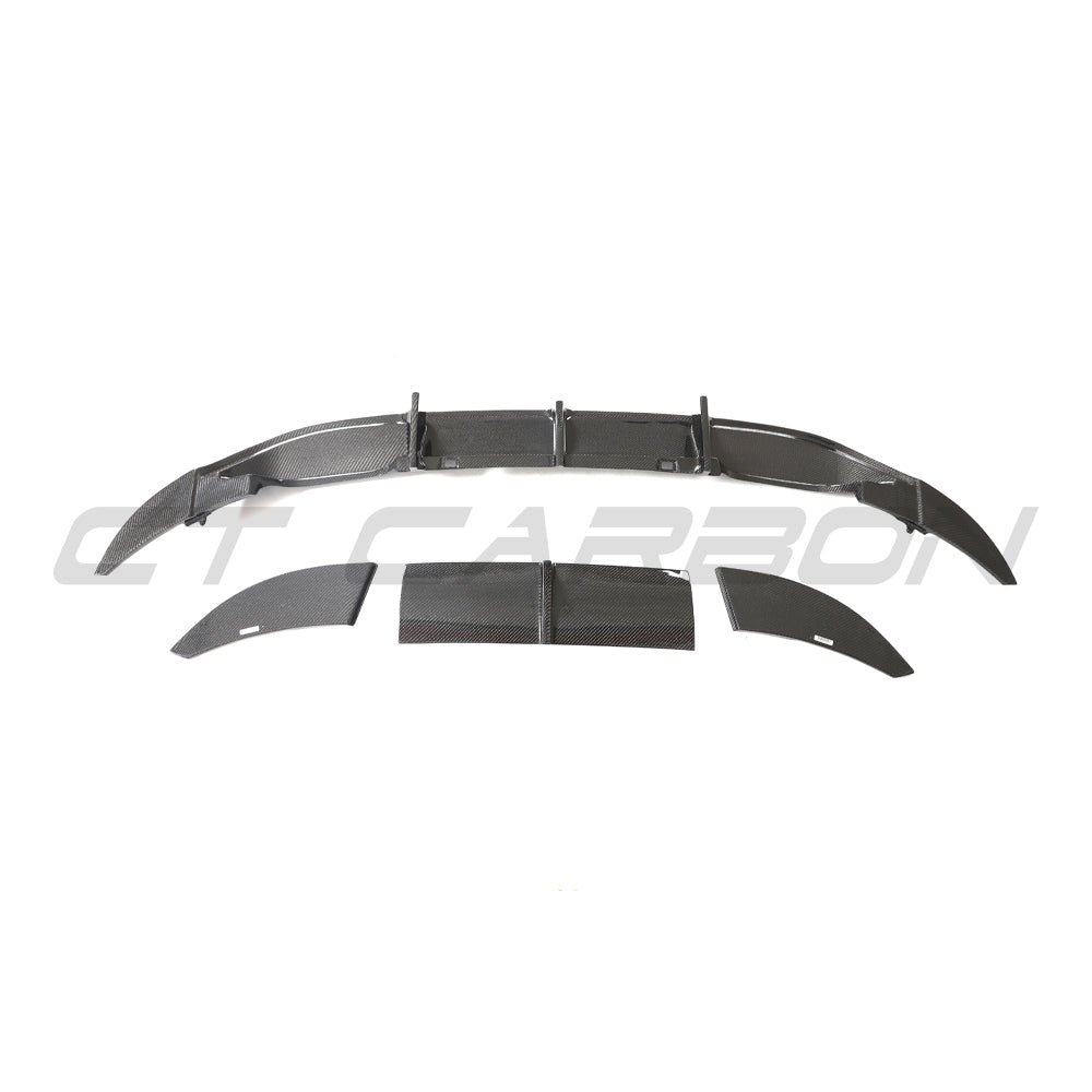 VW Golf R MK7 2014-2017 CT Carbon carbon fiber diffuser showing sleek aerodynamic design and textured finish.