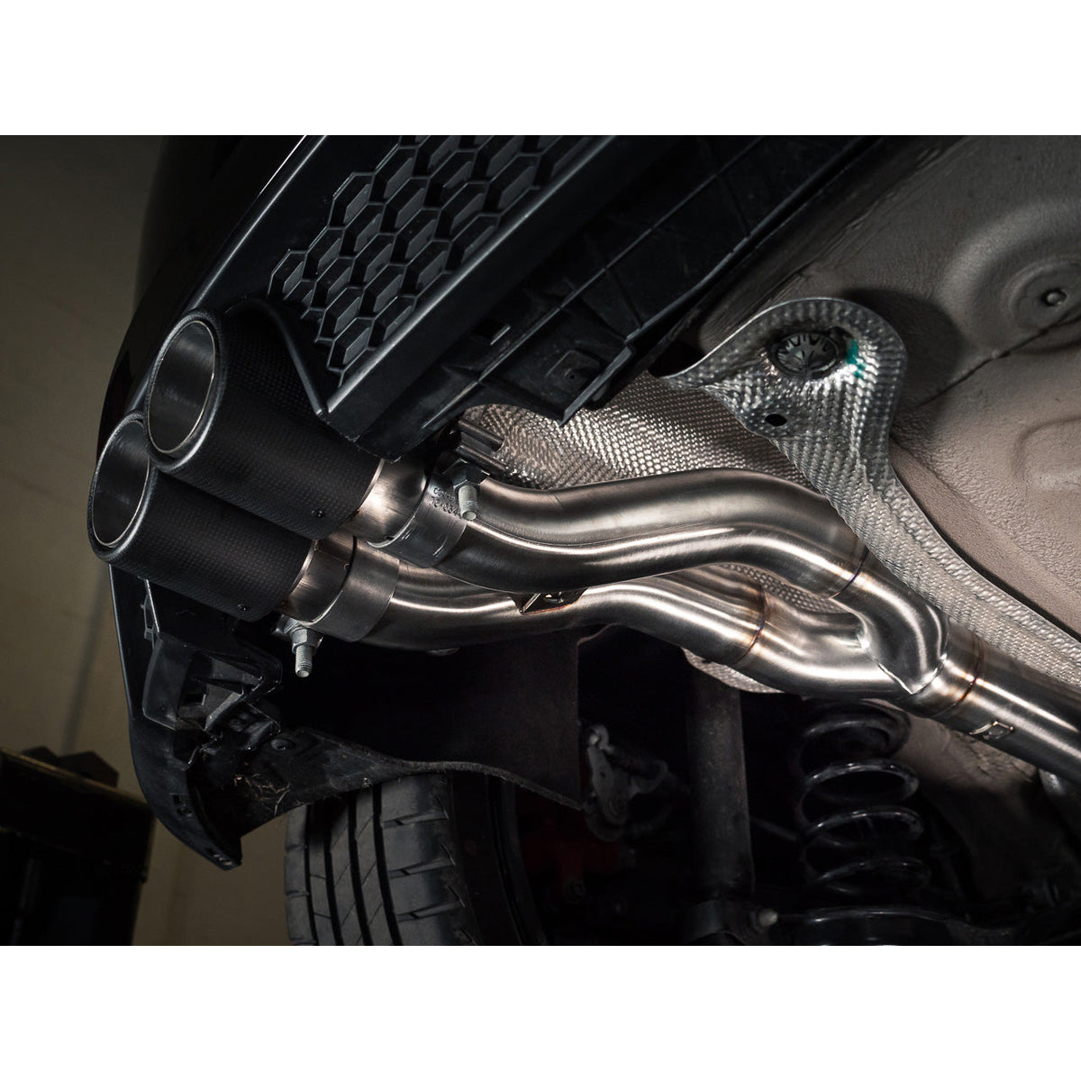 Cobra Sport VW Polo GTI AW Mk6 2.0 TSI Venom turbo back performance exhaust installed on the car's rear underside.