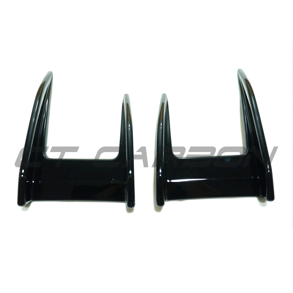 BMW F40 1 Series 2019-2024 CT Carbon gloss black front canards accessory on a car showing close-up of the aerodynamic add-ons