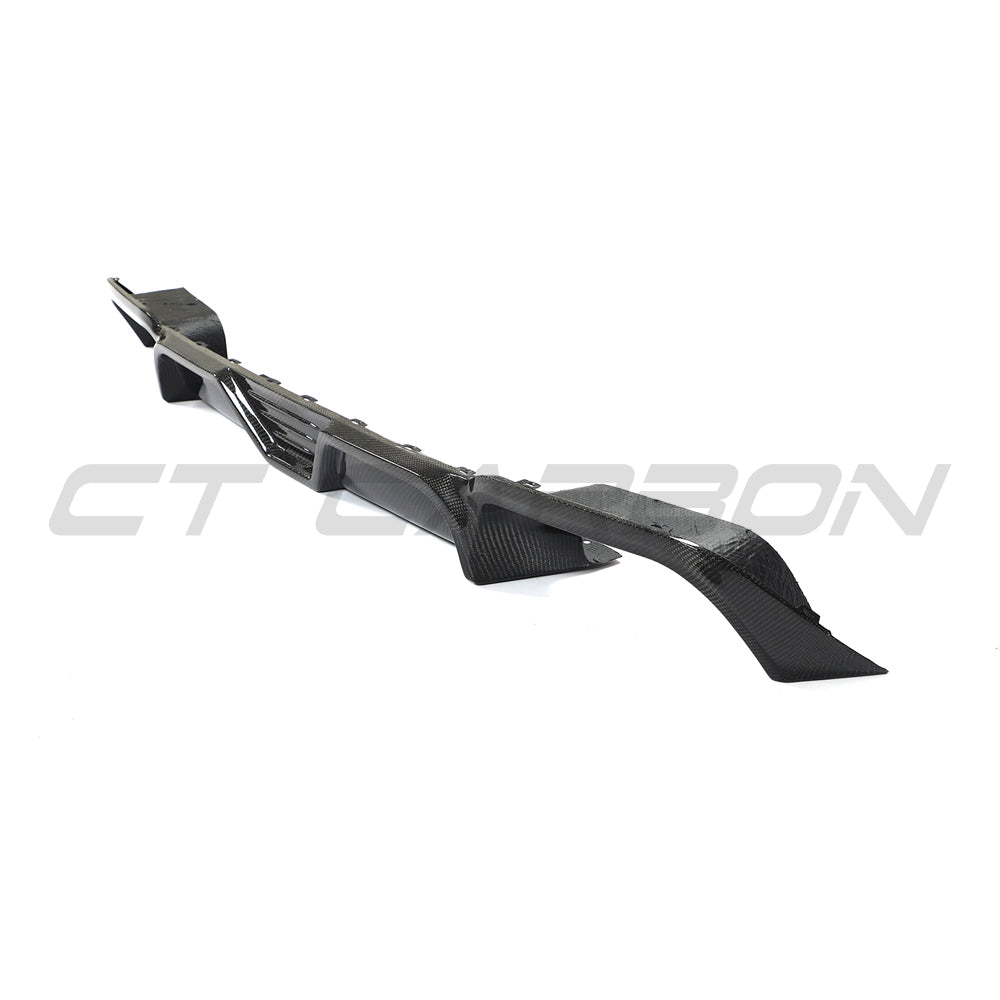 CT Carbon X3M F97 2018-2021 car diffuser with carbon fiber finish, visible aerodynamic design and sleek surface details.