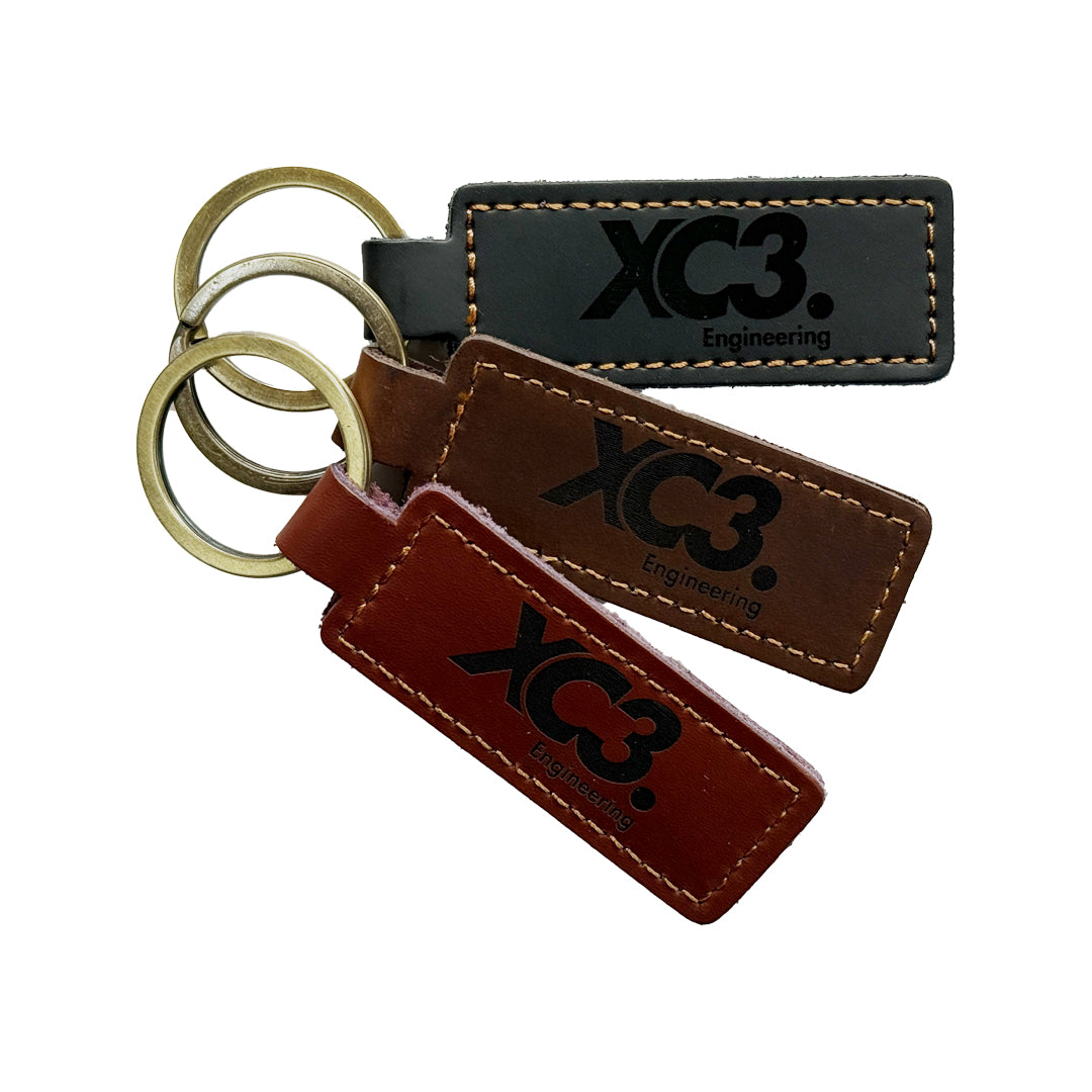Leather keyring by XC3 Engineering, durable and stylish accessory with a sleek design, perfect for organizing keys.