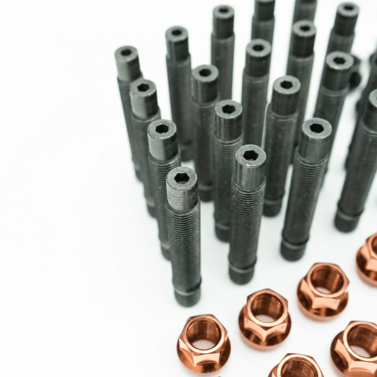 Bimecc VW Audi SEAT Skoda wheel stud and copper nut kit close-up, black studs and copper nuts