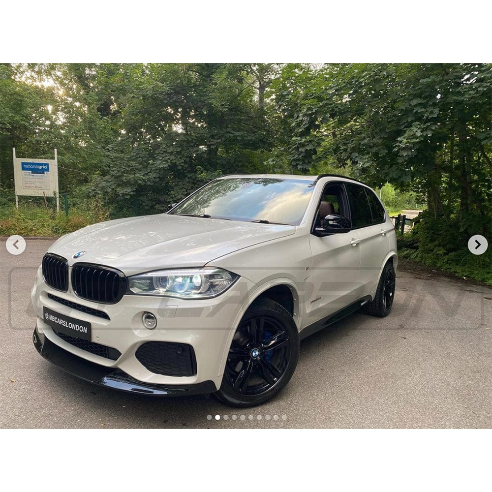 BMW X5 F15 2014-2018 CT Carbon gloss black full kit, including exterior parts with a sleek, reflective black finish.