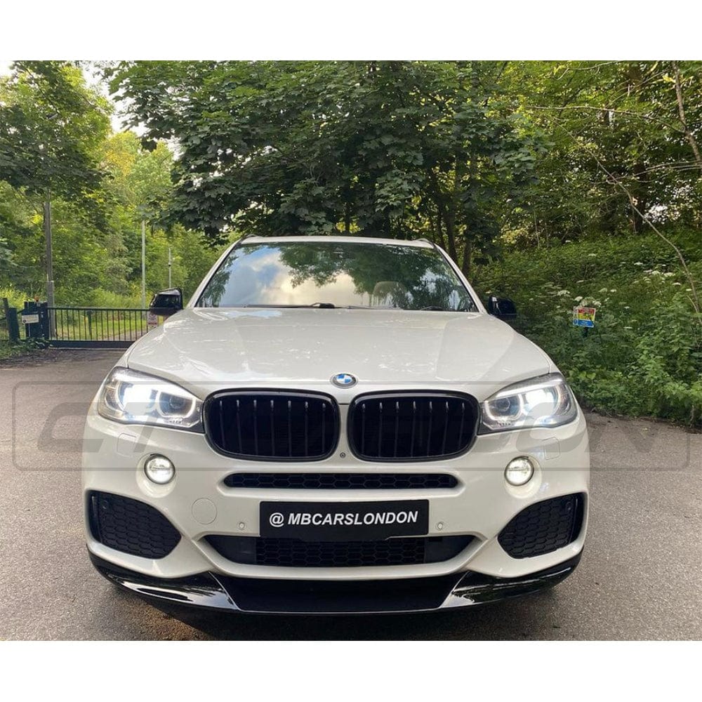 BMW X5 F15 2014-2018 CT Carbon gloss black full kit, MP style, showcasing sleek black carbon fiber exterior accessories.