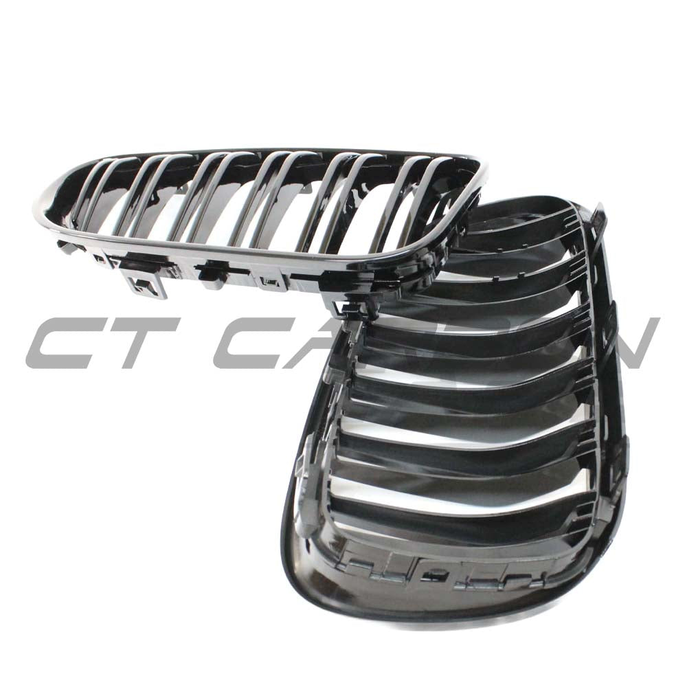 Black BMW E92 and E93 3 Series LCI double slat grille by CT Carbon, showcasing sleek black grille design for BMW M3 and 3 Series.