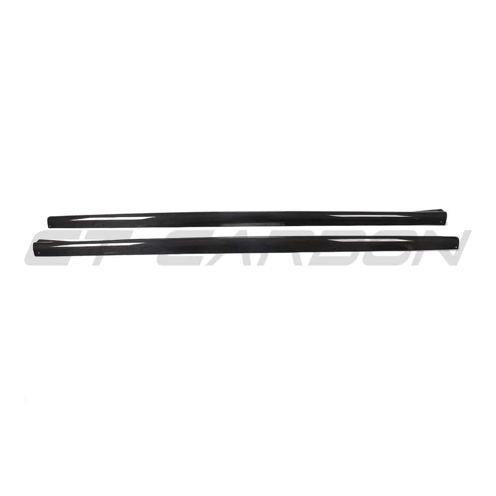 Black BMW G22 4 Series carbon fiber side skirts and diffuser kit by CT Carbon, showcasing sleek, high-performance car accessories.
