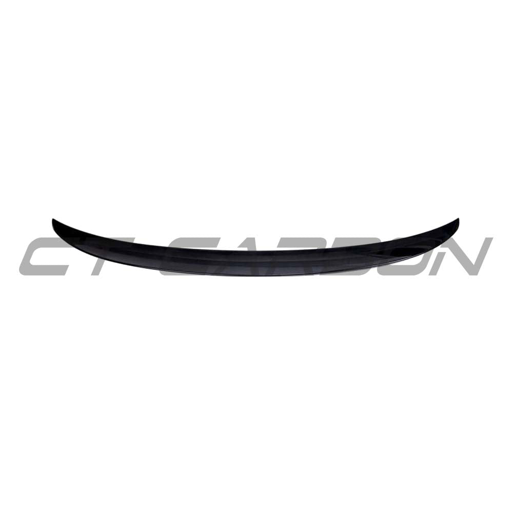 Black BMW 5 Series G30 gloss black V5 spoiler by CT Carbon, featuring a sleek MP style design on a vehicle.