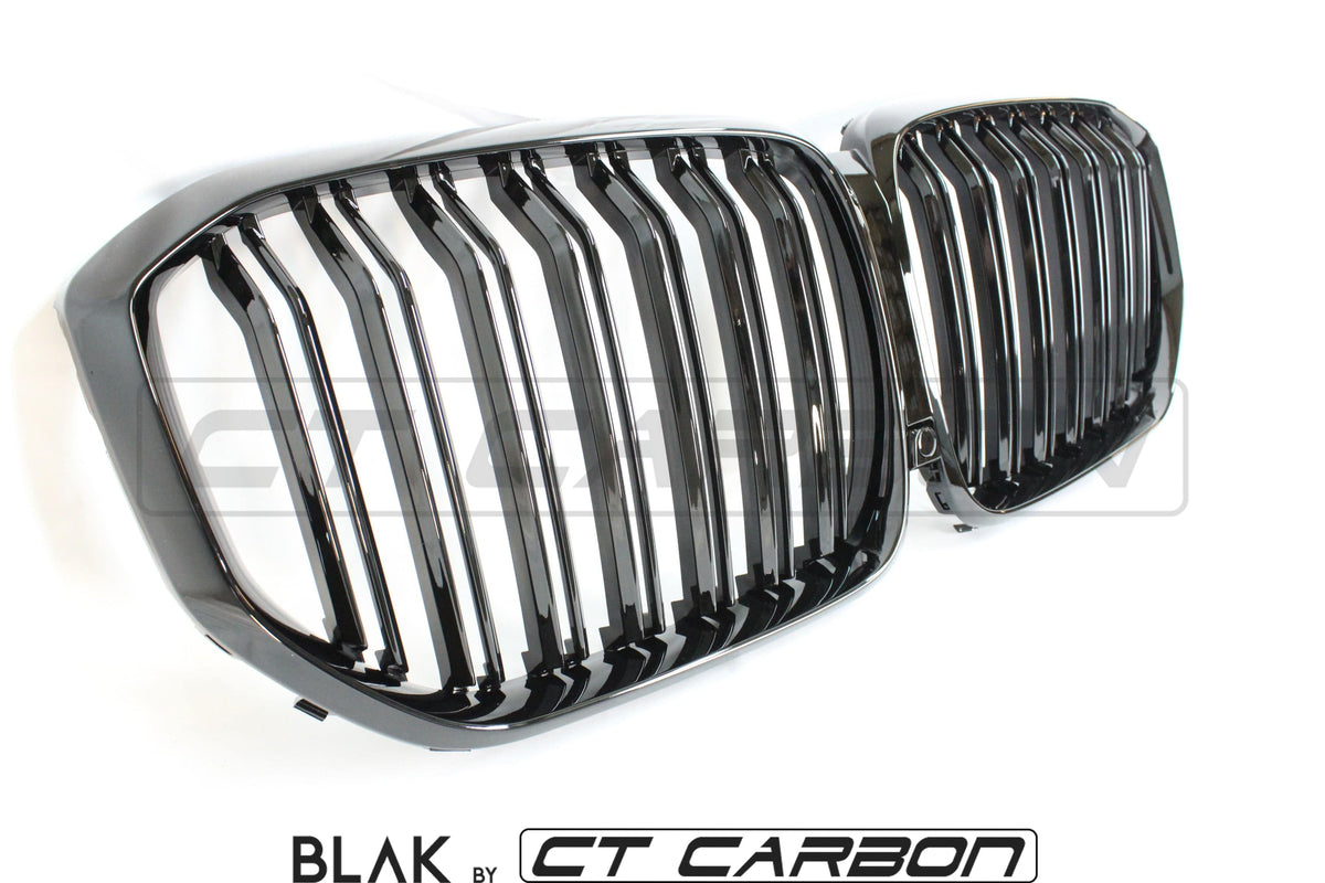 BMW X5 G05 2018+ CT Carbon double slat black grille showing close-up of sleek, black grille design on vehicle front.