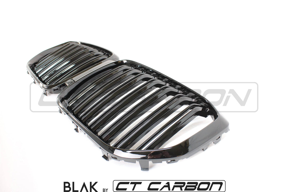 BMW X5 G05 2018+ double slat black grille by CT Carbon, showing sleek black grille with dual slats on a vehicle.