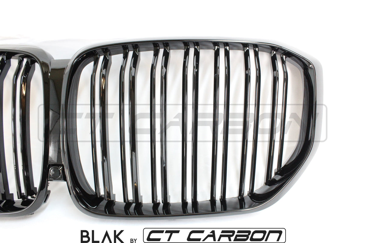 BMW X5 G05 2018+ double slat black grille by CT Carbon, showcasing sleek black grille design with multiple slats on the front of the vehicle.