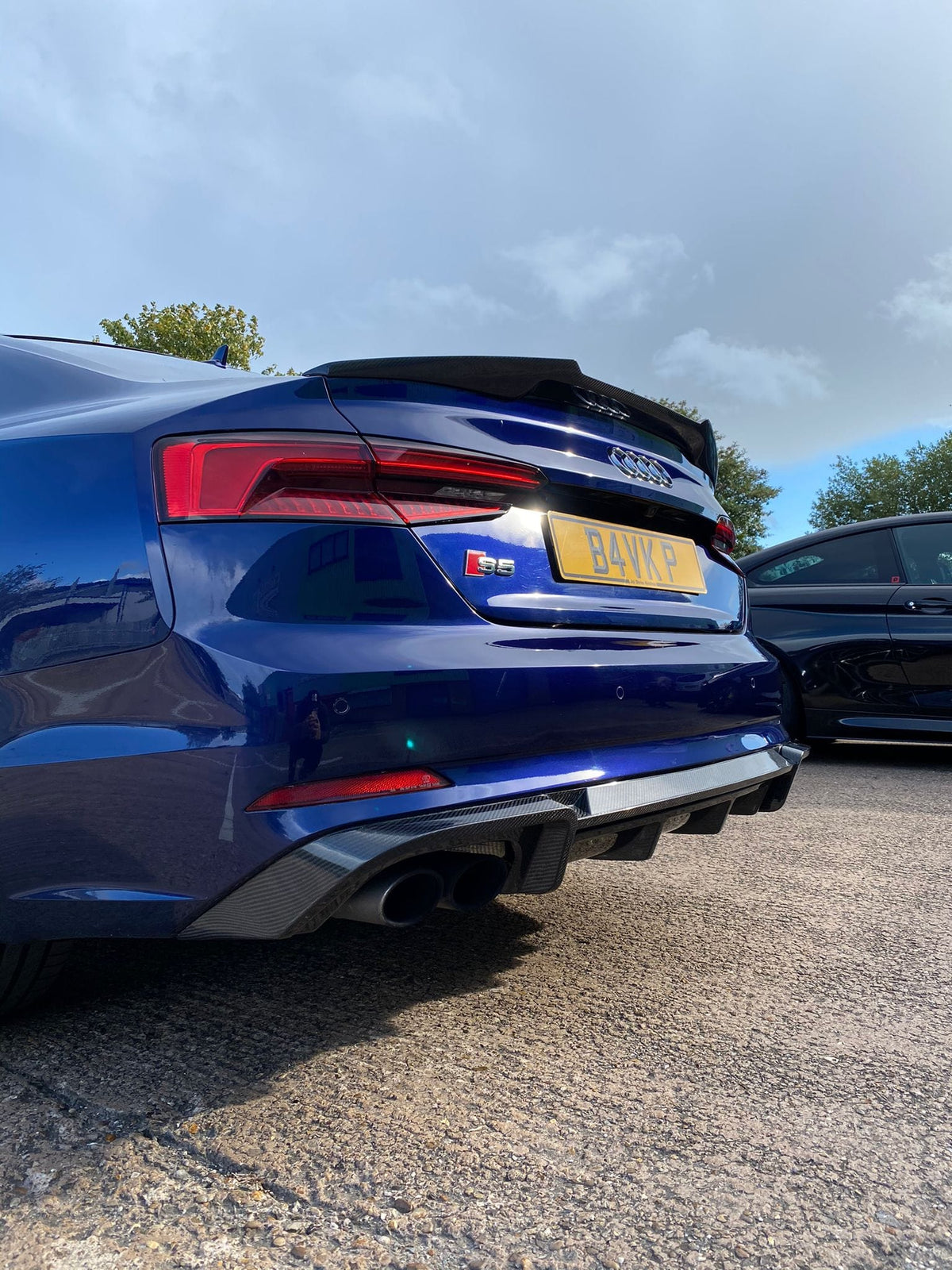 Carbon fibre diffuser for Audi A5 S5 B9 (2017-2021) by CT Carbon, showcasing the sleek, textured design for sporty styling.