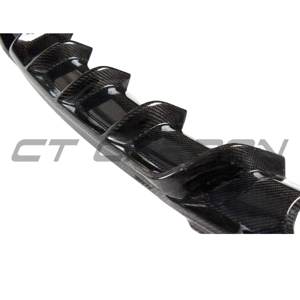 BMW F30/F31 3 Series carbon fiber diffuser with twin exhaust, CT Carbon V1 style, mounted on black car with sleek design