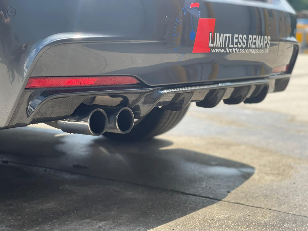 BMW F30/F31 3 Series carbon fibre diffuser with twin exhaust by CT Carbon, showcasing sleek V1 design and MP style finish.