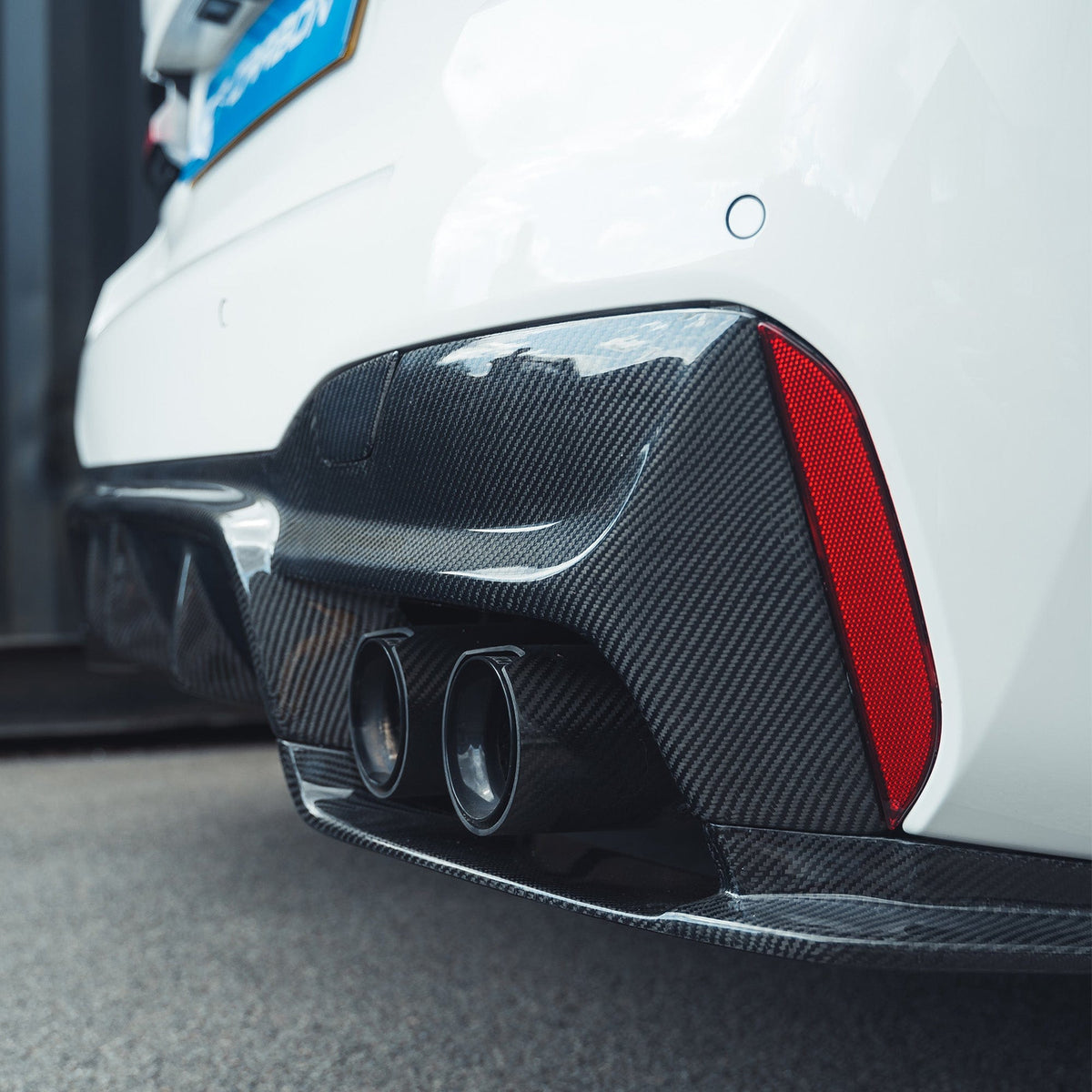 BMW F90 M5 CT Carbon V2 carbon fibre diffuser with 3D style design, showcasing sleek, aerodynamic enhancement for the car.