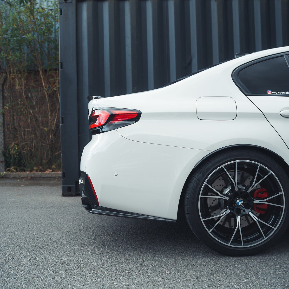 BMW F90 M5 CT Carbon V2 carbon fibre diffuser showing sleek 3D-style design on the rear of the sports car.