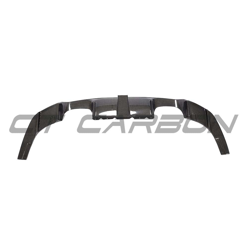 BMW M2 F87 carbon fibre diffuser by CT Carbon featuring K-style aerodynamic design on a sleek sports car.