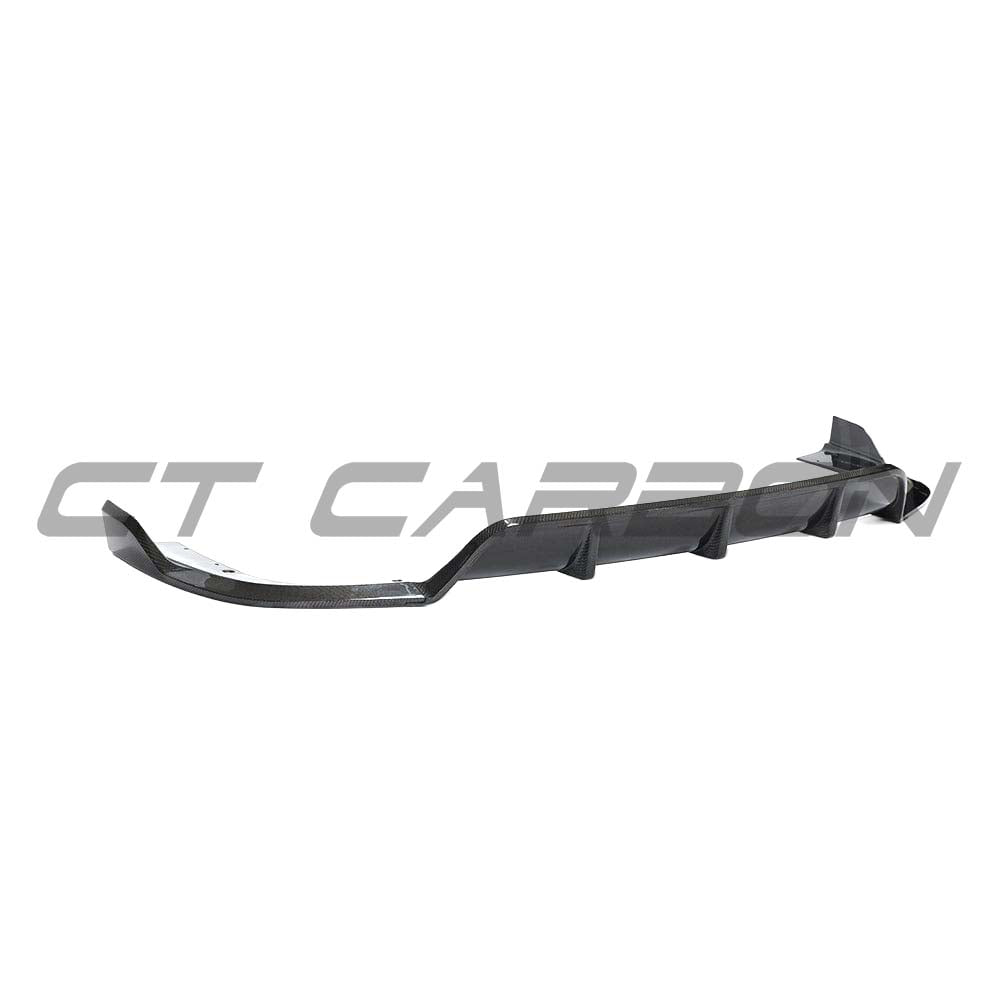 BMW X5 G05 2018-2023 CT Design carbon fibre diffuser, showcasing sleek aerodynamic design and textured carbon fibre surface.