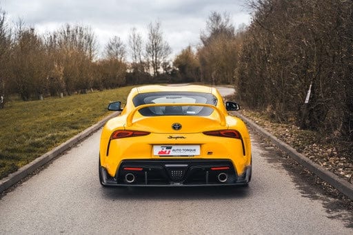 Toyota Supra 2019+ A90 CT Carbon carbon fiber diffuser installed on the rear of the sports car.