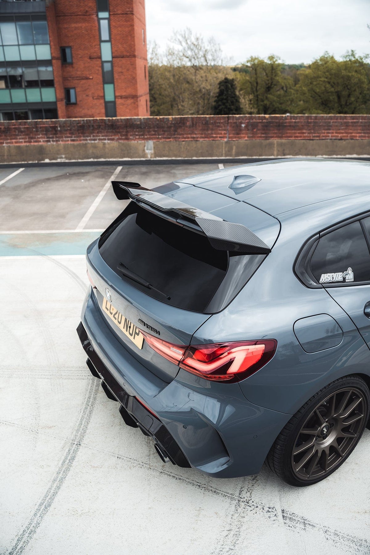 BMW 1 Series F40 2019-2024 CT Design full carbon fibre kit installed on the car, showcasing sleek, lightweight carbon fibre accents.