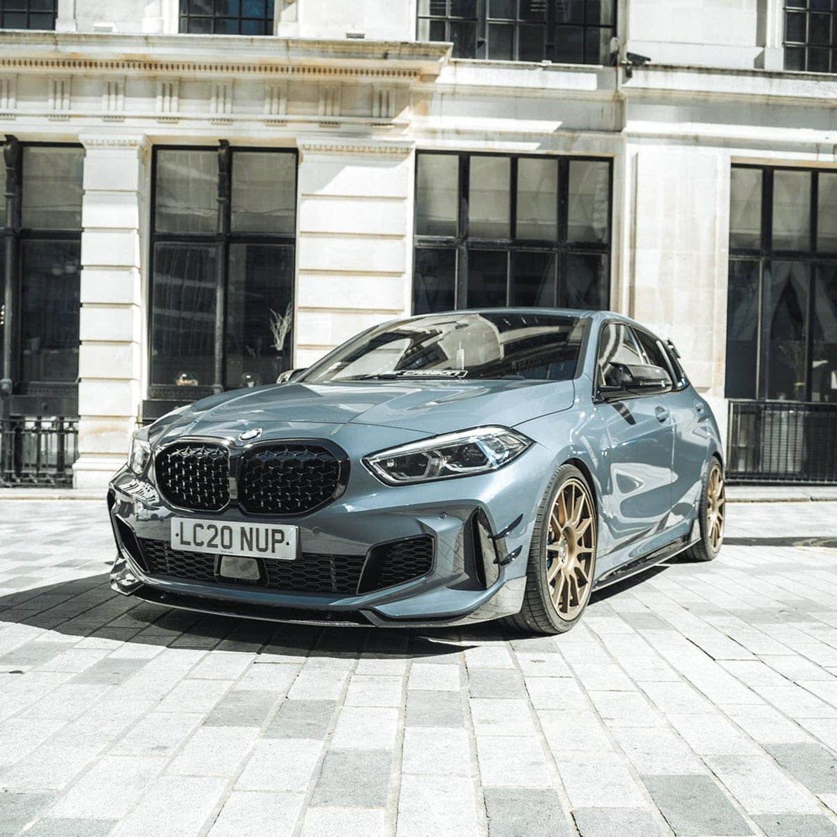 BMW 1 Series F40 2019-2024 CT Design full carbon fibre kit installed on the car, showcasing sleek, lightweight carbon fiber accents.