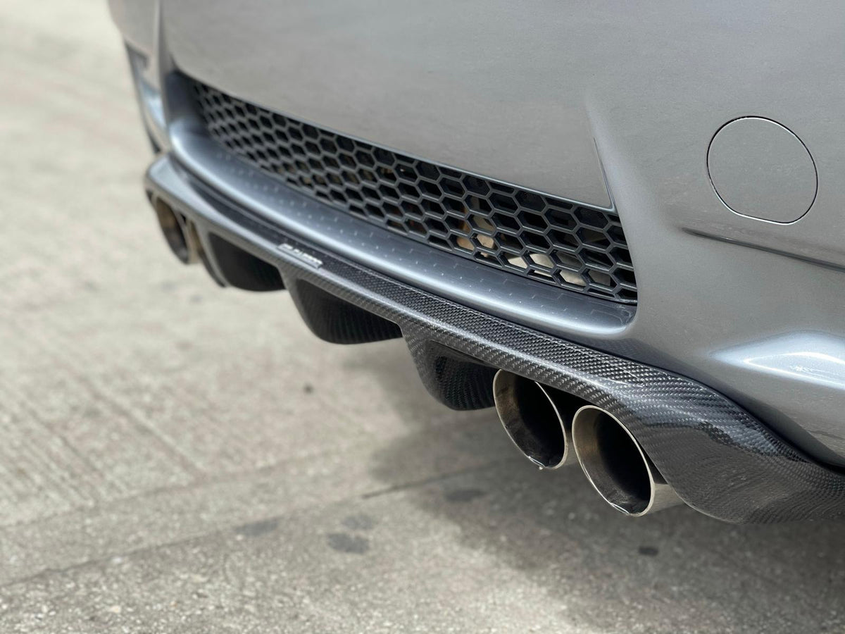 BMW E92 M3 full carbon fiber kit by CT Carbon, showing detailed carbon fiber panels and aerodynamic components.