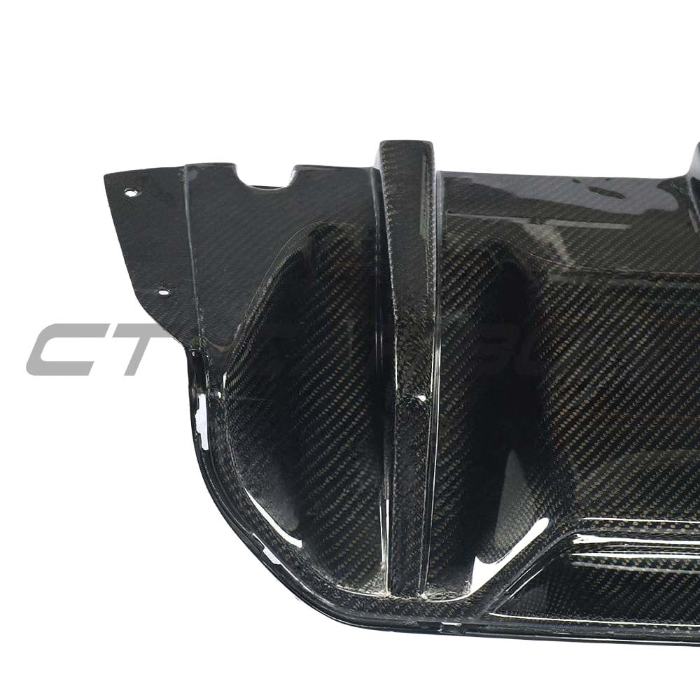 BMW F90 M5 saloon with CT Carbon full carbon fibre kit, GTS style, featuring front splitter, side skirts, and rear diffuser.