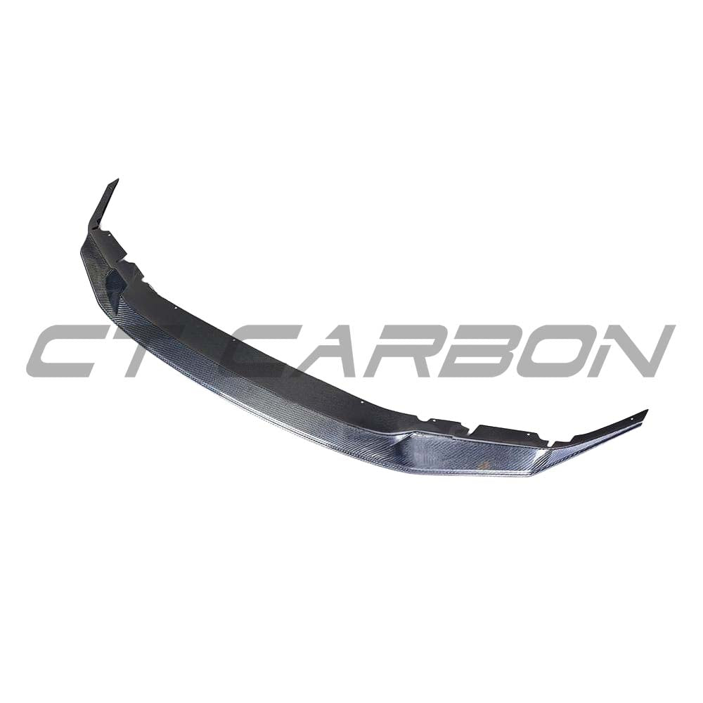 BMW F90 M5 saloon with CT Carbon full carbon fiber kit, GTS style, showcasing aerodynamic body enhancements and sleek carbon details.