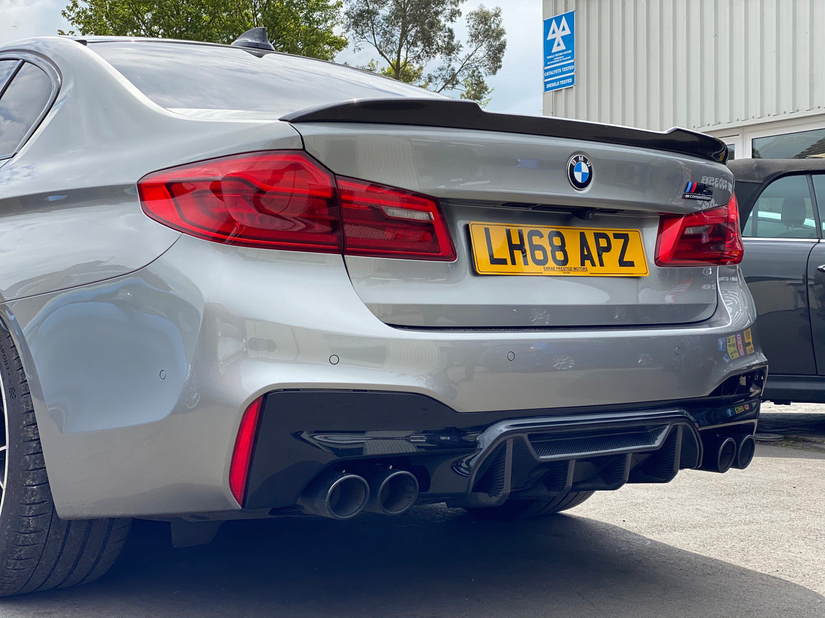 Full BMW F90 M5 saloon with CT Carbon GTS-style full carbon fibre kit, showcasing sporty, aerodynamic carbon fiber components.