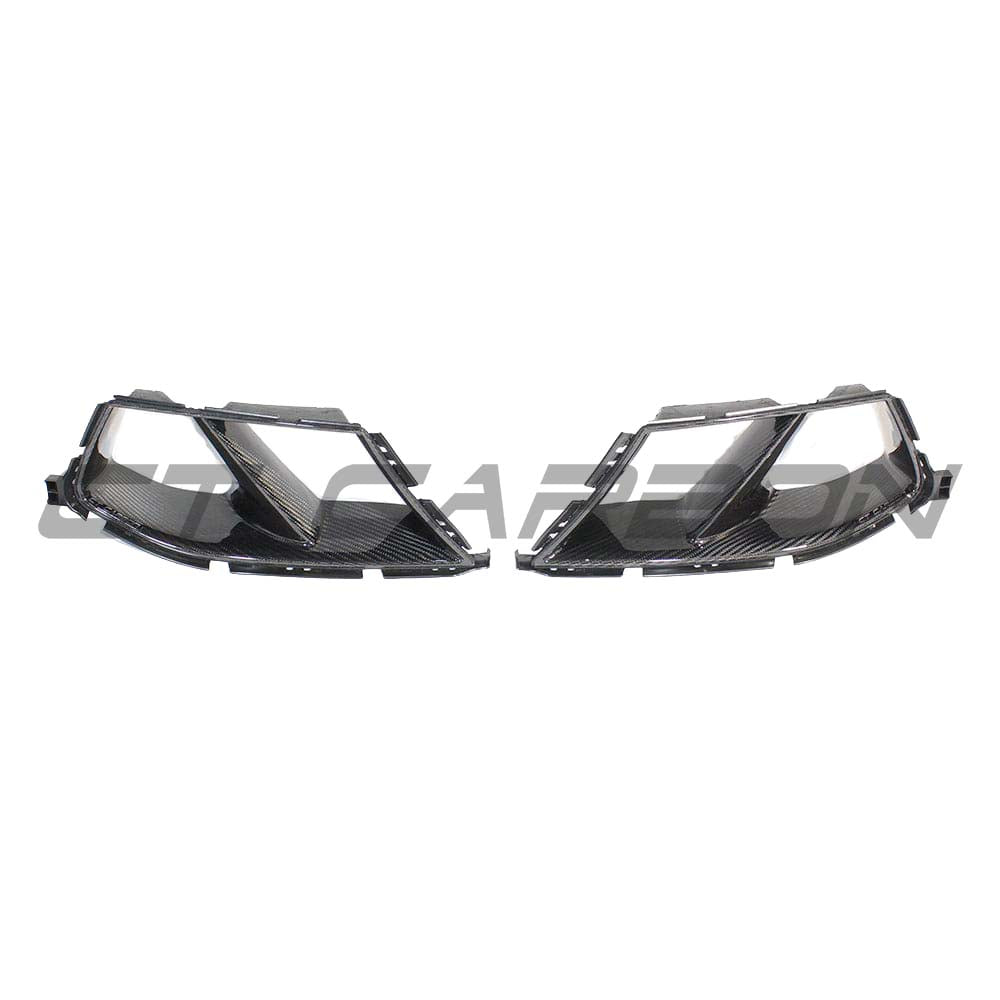 BMW M3 M4 G80 G82 G83 carbon fibre front end pack by CT Carbon, featuring bumper ducts and MP style design.