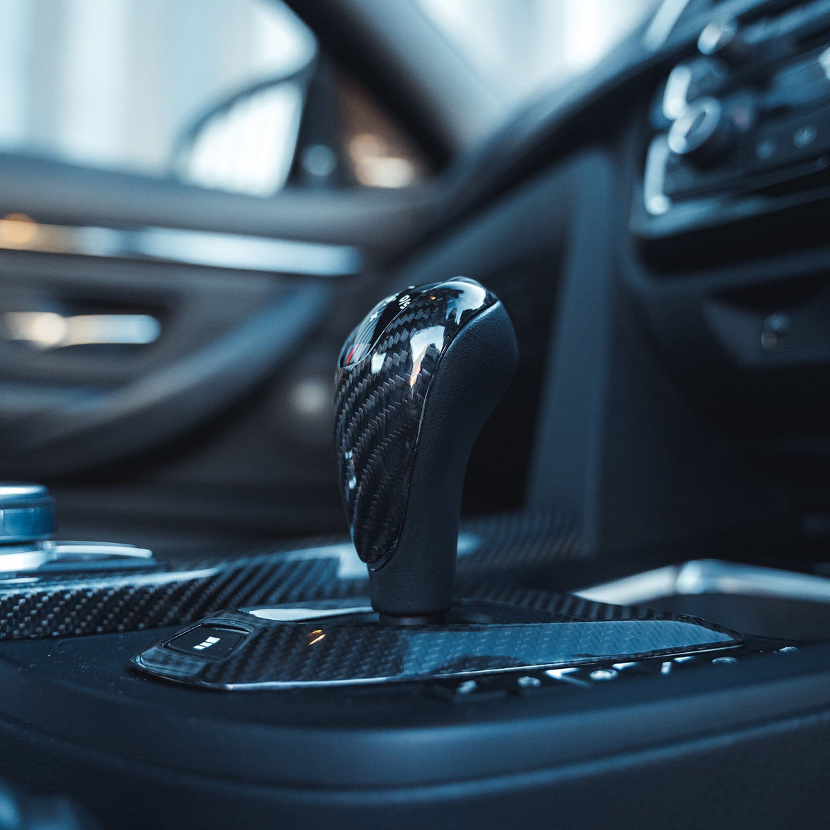 BMW Fxx M car DCT shifter and surround set by CT Carbon, LHD interior accessories with carbon fiber finish.