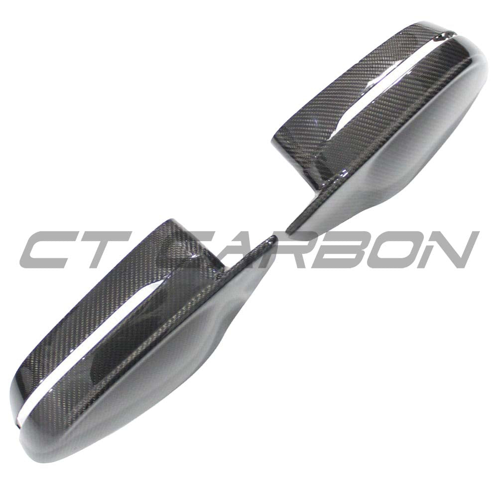 BMW M2 M3 M4 G80 G82 G83 G87 carbon fibre replacement mirrors by CT Carbon, LHD, showing sleek aerodynamic design.