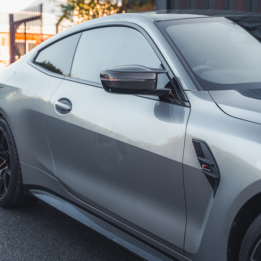 BMW M2 M3 M4 G80 G81 G82 G83 G87 carbon fiber replacement mirrors by CT Carbon, LHD side, sleek sporty car accessories.