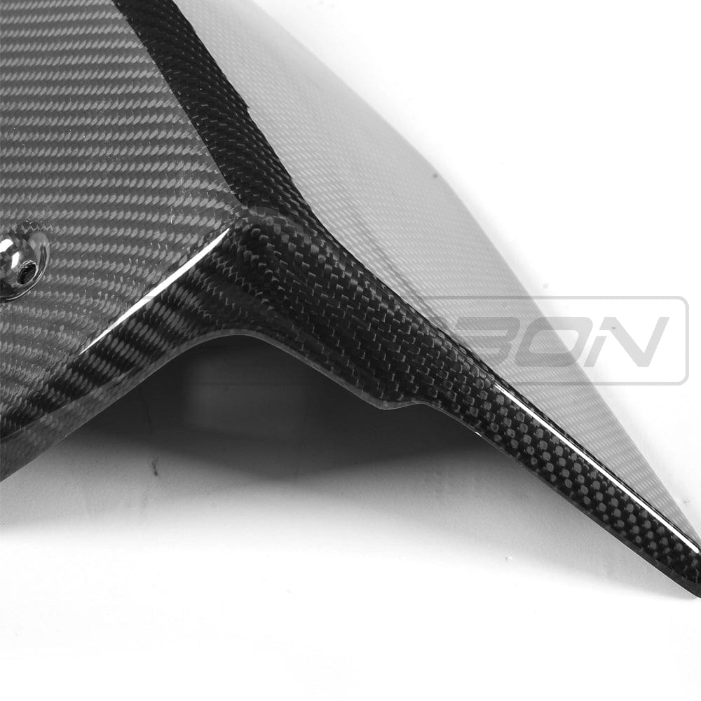 BMW F16 X6 Carbon Fibre Rear Bumper Extensions by CT Carbon, automotive accessories, close-up view of sleek rear bumper enhancements.
