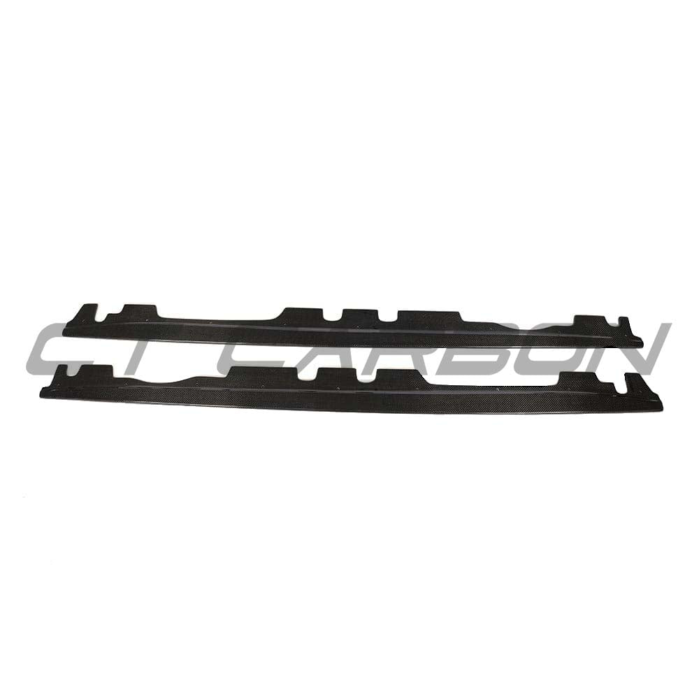 BMW M3 E92 carbon fibre side skirts by CT Carbon, showing sleek, lightweight side panel enhancements with textured carbon fiber finish.
