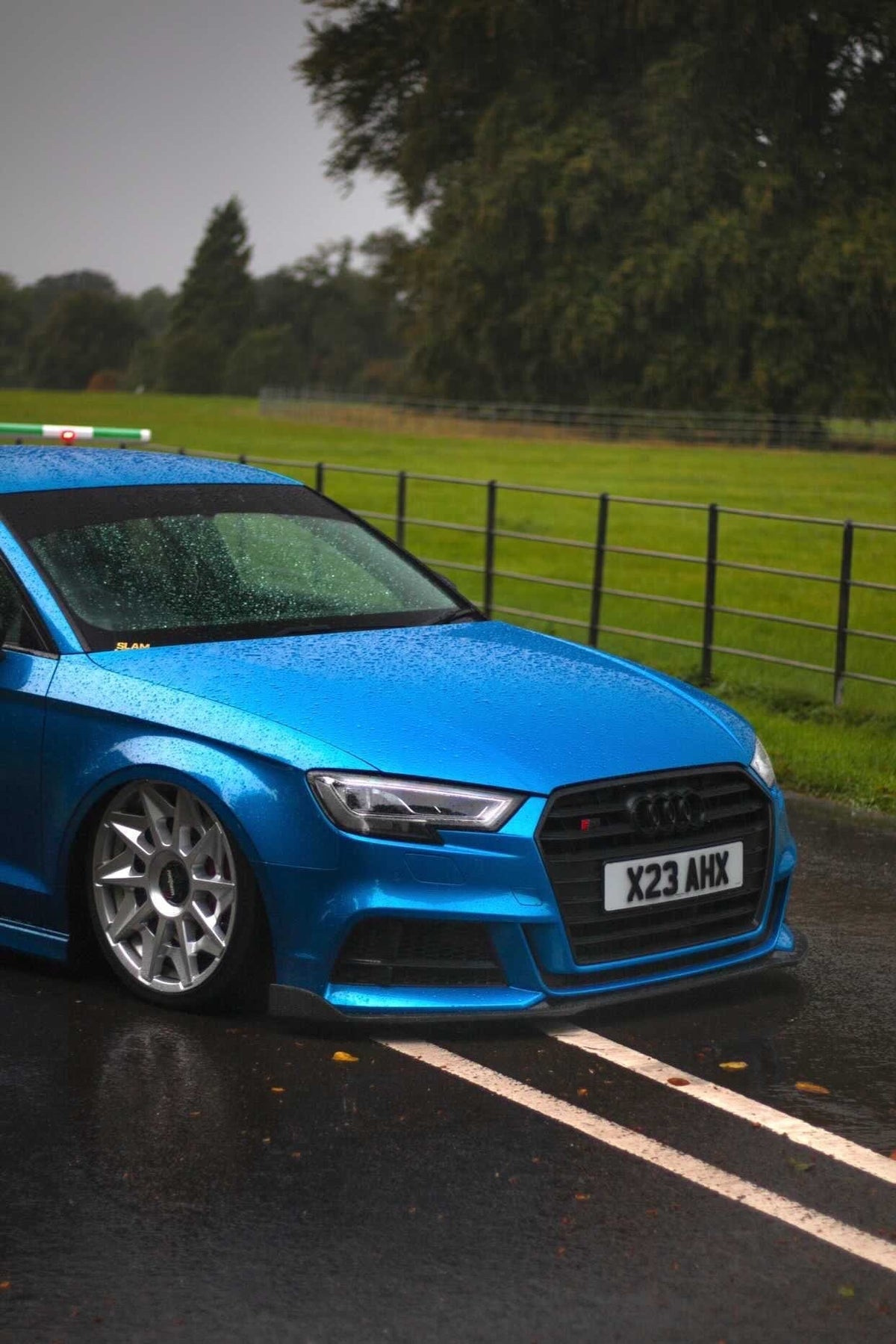 Carbon fiber splitter for Audi A3 S-Line and S3 facelift 8V saloon by CT Carbon, showcasing sleek aerodynamic design.