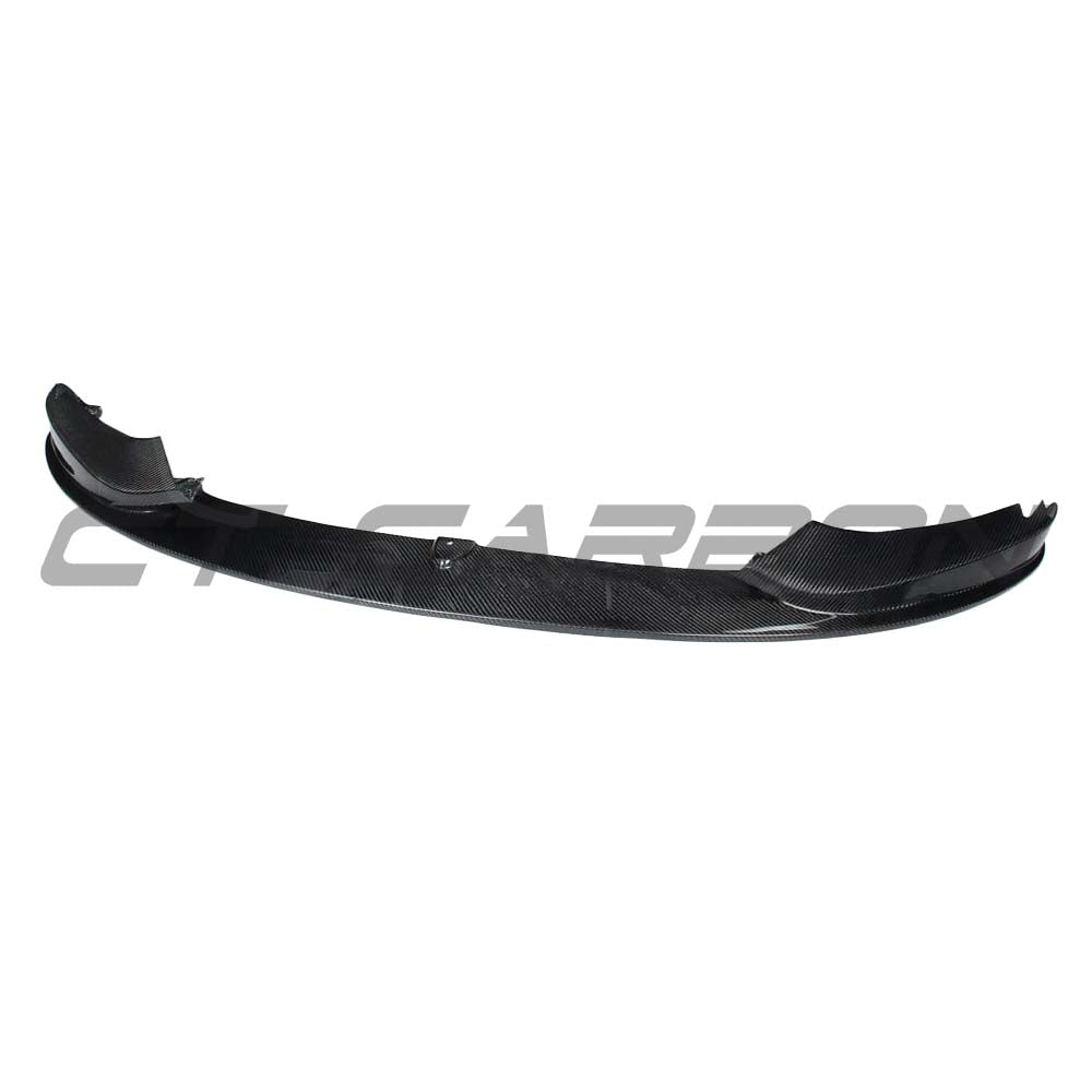 BMW F32/F33/F36 4 Series carbon fiber splitter by CT Carbon, showing the sleek, aerodynamic design on the vehicle.
