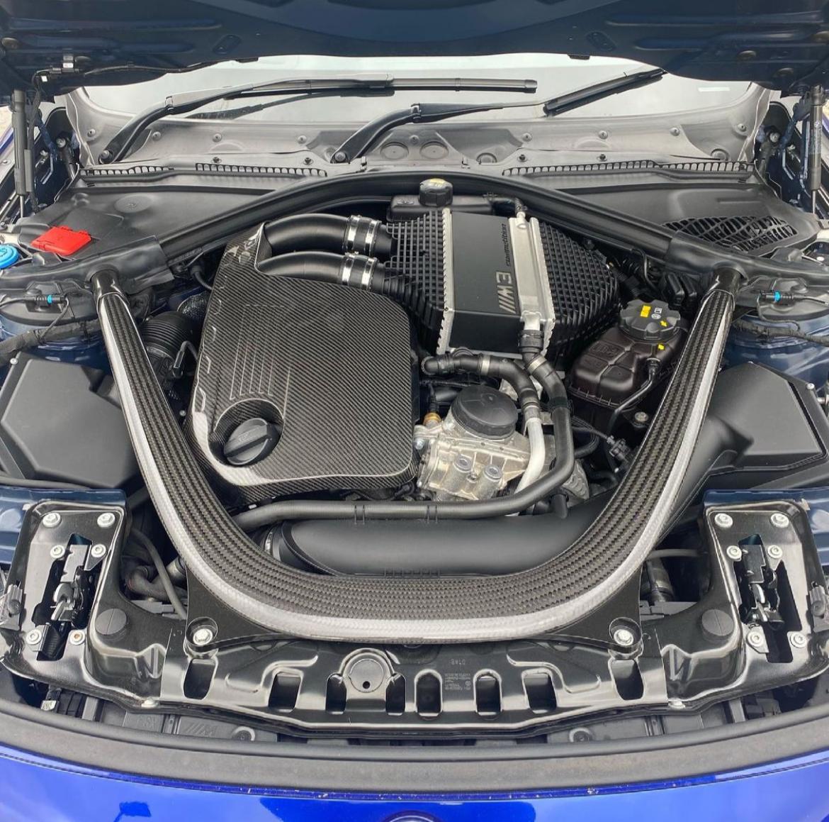 BMW F80/F82/F83/F87 M2C M3 M4 Carbon Fibre Engine Cover by CT Carbon, showcasing sleek, lightweight carbon fiber design.