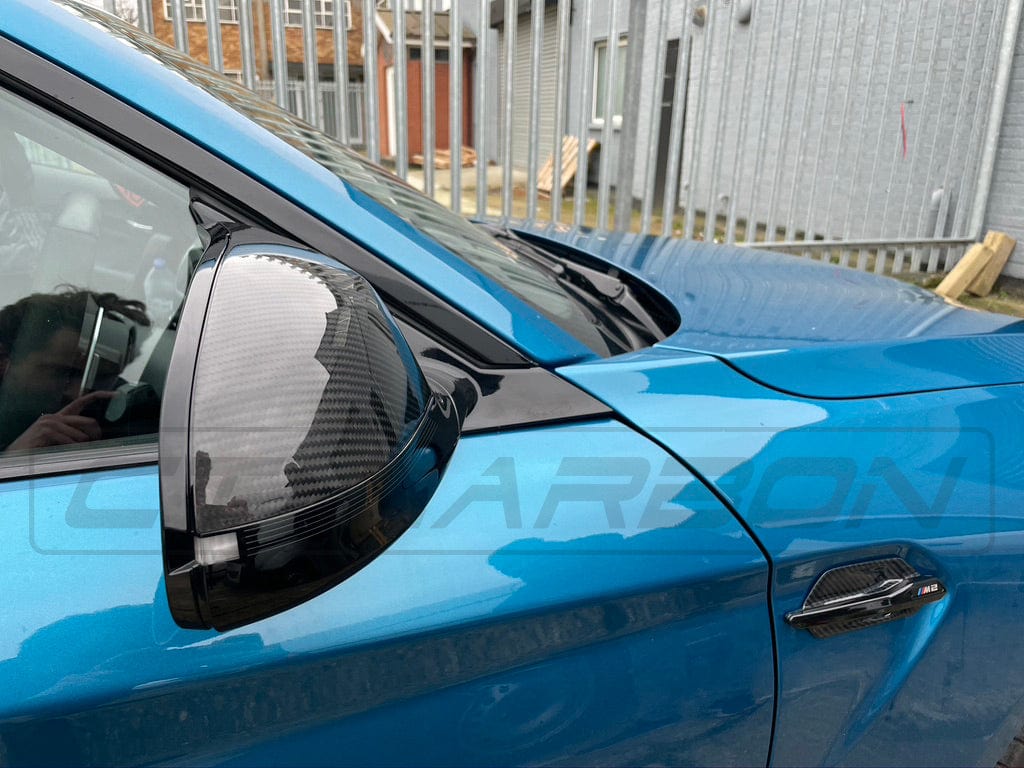 BMW F80-F87 M2C M3 M4 carbon fibre side mirrors by CT Carbon, LHD only, sleek aerodynamic design for enhanced style and performance.