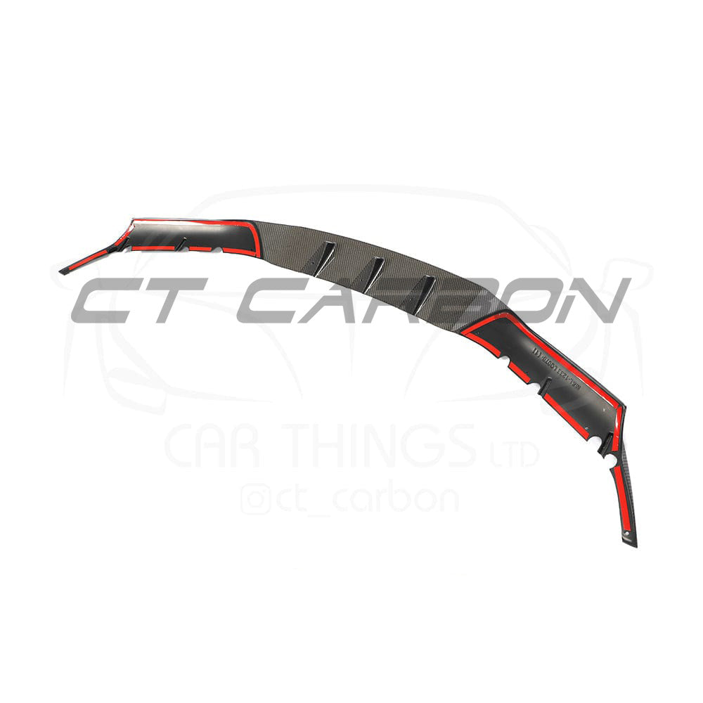 BMW F90 M5 Competition carbon fibre splitter by CT Carbon, showing the sleek, aerodynamic design and R-style detailing.