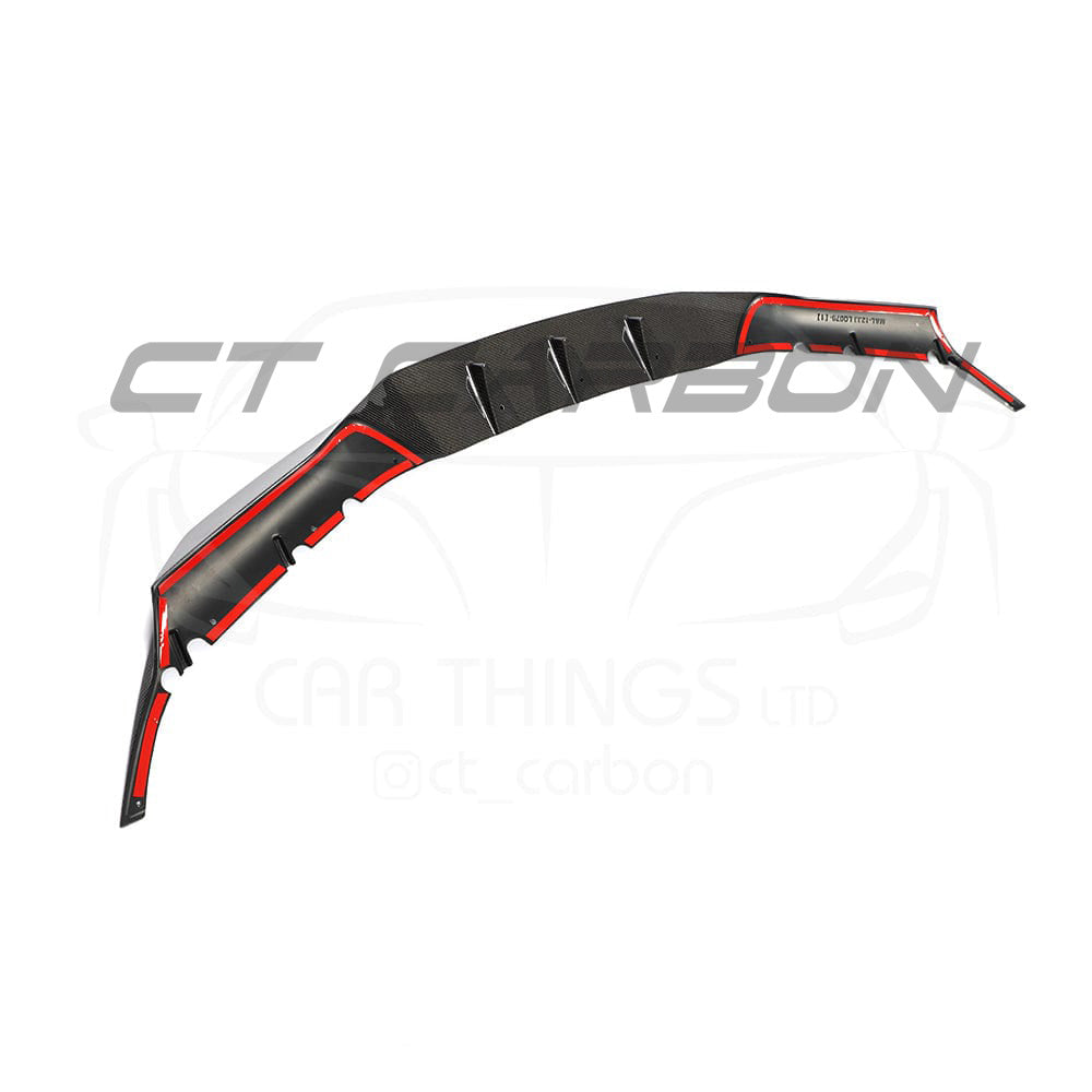 BMW F90 M5 Competition carbon fibre splitter by CT Carbon, showcasing sleek R-style design on a black car.