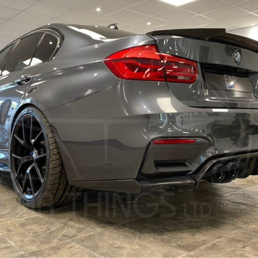 Full view of a BMW M3 F80 saloon with CT Carbon V3 full carbon fibre kit, showcasing the carbon fibre splitter and aerodynamic enhancements.