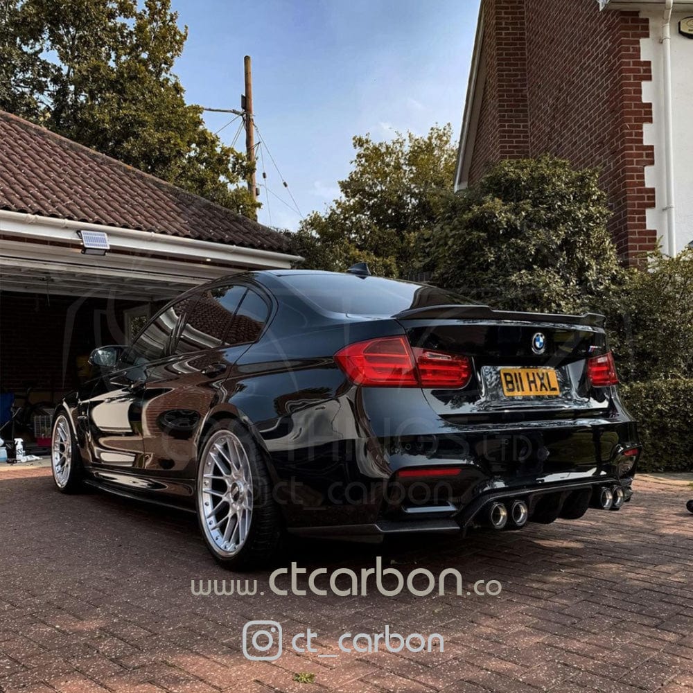 Full car view of a BMW M3 F80 saloon with CT Carbon V3 full carbon fibre kit, showcasing sporty aerodynamic components.