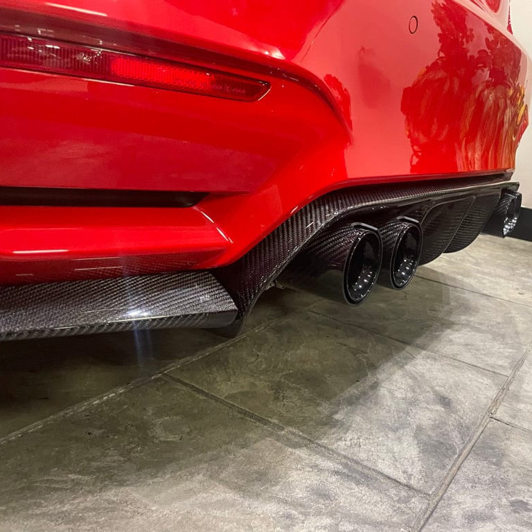 BMW M3 F80 full carbon fibre kit from CT Carbon, includes splitters and body panels, showcasing sleek, lightweight carbon fibre design.