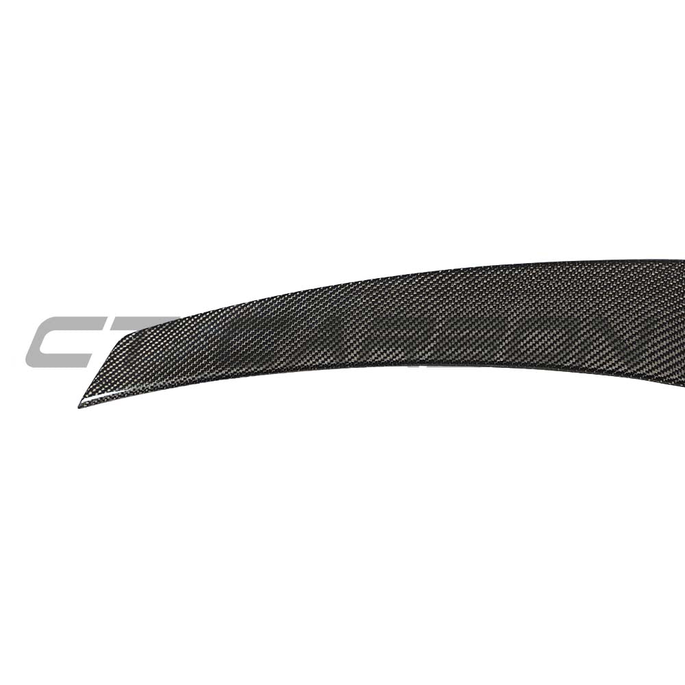 Full BMW M3 F80 carbon fiber kit by CT Carbon, including splitters and body parts, showcasing sleek carbon fiber finish.