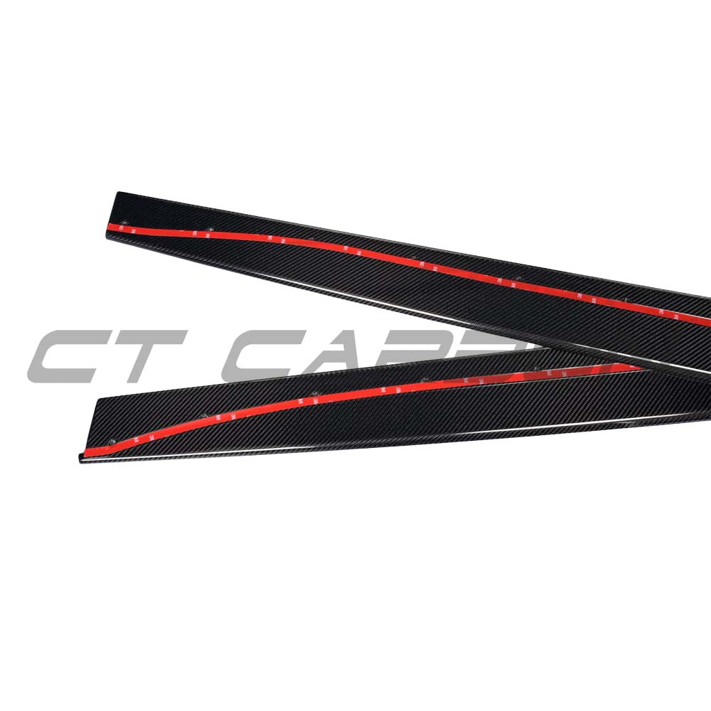 Full BMW M3 F80 carbon fibre kit by CT Carbon, including splitter and body panels, showcasing sleek, lightweight carbon fibre components.