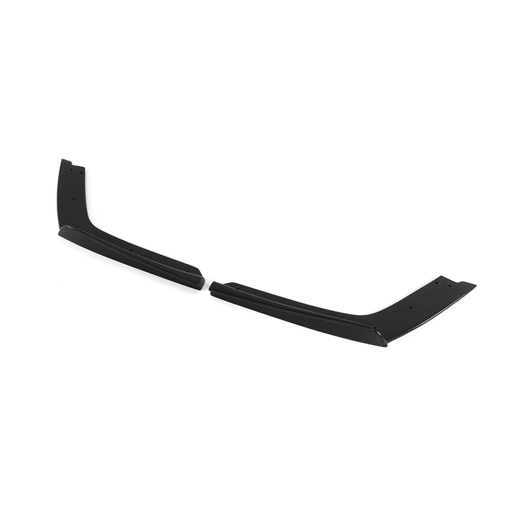 BMW M3 M4 F80 F82 F83 carbon fiber rear bumper corners by CT Carbon, showing sleek, lightweight automotive accessory details.